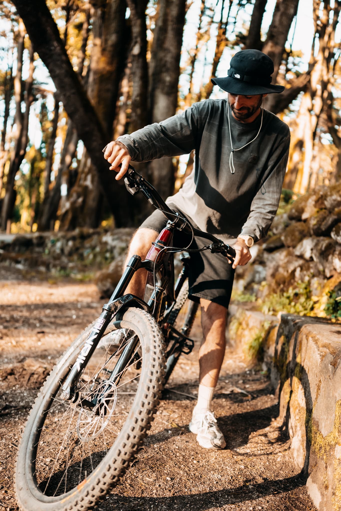 Marcel adjusting his bike before a ride